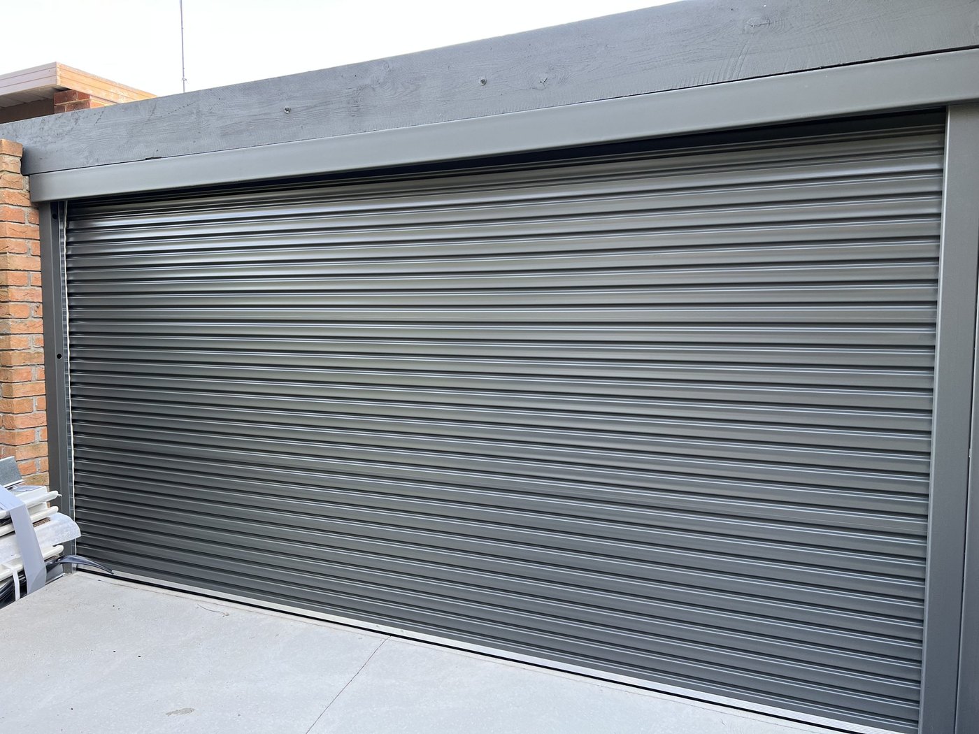 Charcoal roller door installed by On A Roll